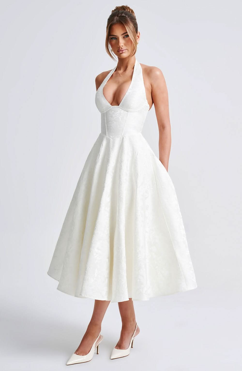Cream halter midi dress with full A-line skirt and fitted bodice
