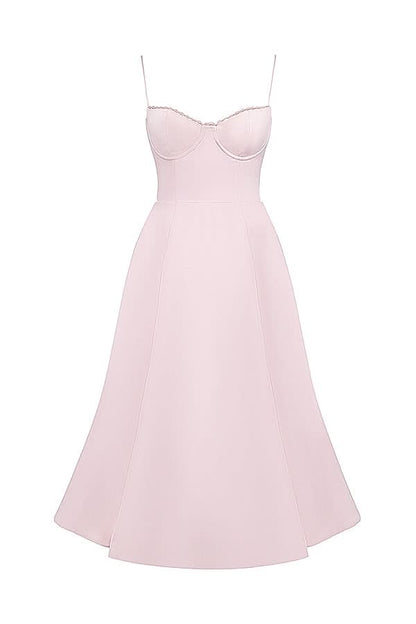 Two women wearing blush pink midi dresses with structured bodices and full skirts