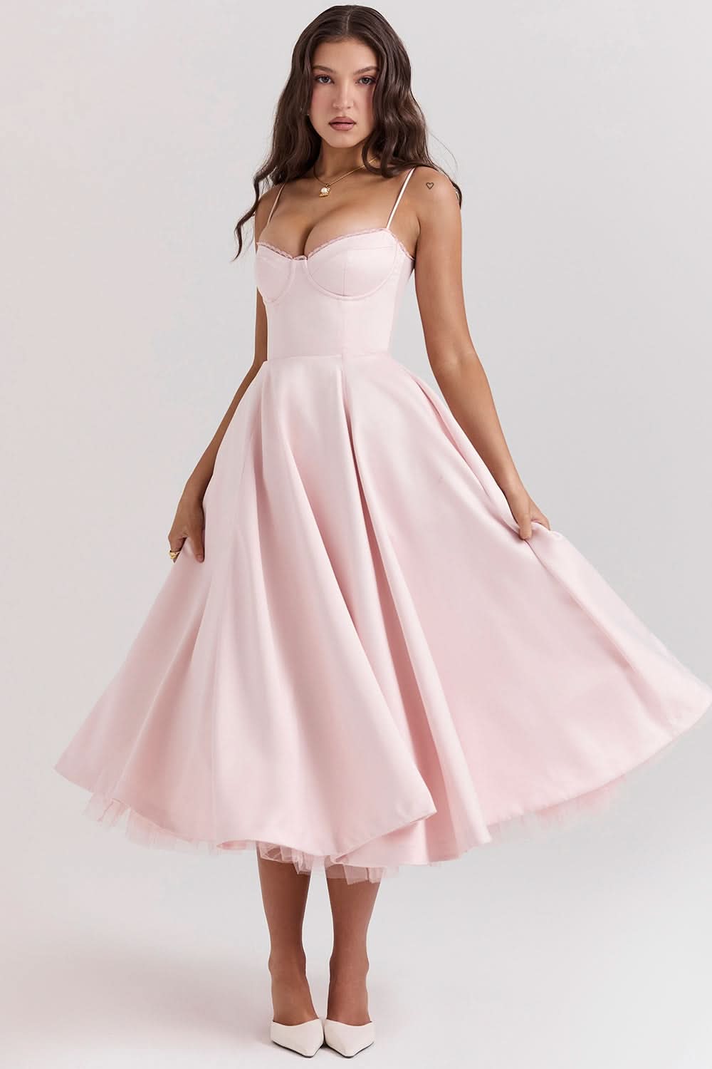 Pink spaghetti strap midi dress with fitted bodice and full skirt