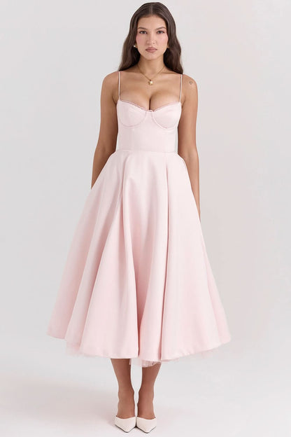 Pink spaghetti strap midi dress with fitted bodice and full skirt