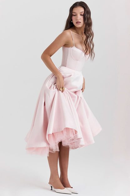 Blush midi dress with spaghetti straps and asymmetrical tulle hem