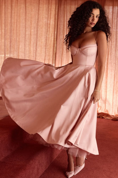 Blush pink midi dress with sweetheart neckline and flowing skirt