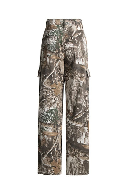 Camo pants with side cargo pockets in woodland print, flat lay