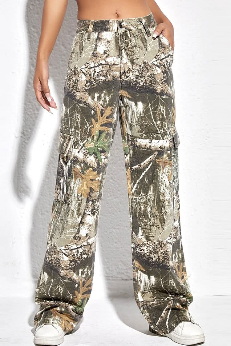 Wide-leg camo pants in forest print styled with white sneakers