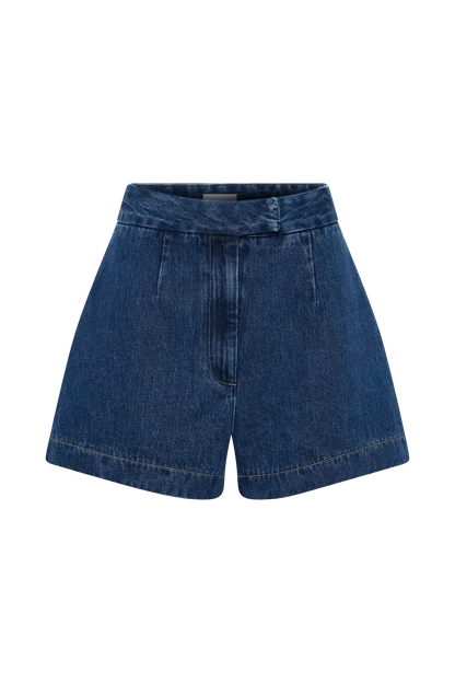 Flat lay of blue denim shorts with topstitched hem