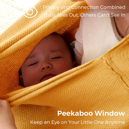Sleeping infant visible through peekaboo window of golden nursing cover