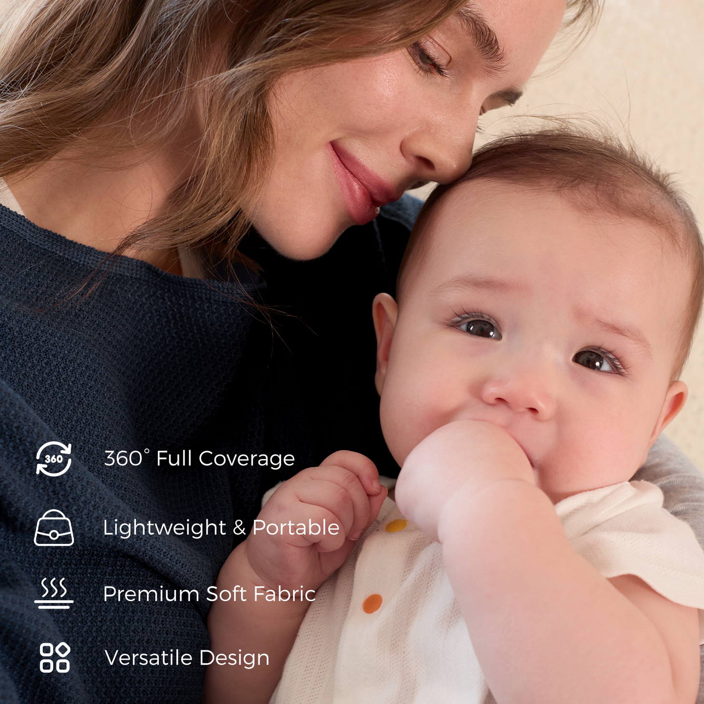 Woman demonstrating 360-degree nursing cover coverage while sitting with baby