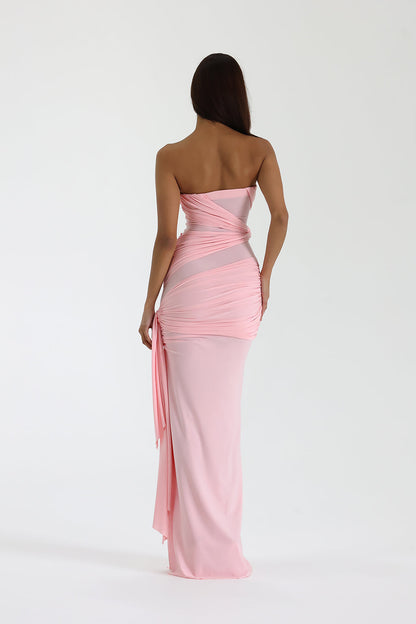 Back view of strapless pink maxi dress showing draped ruching and elegant silhouette