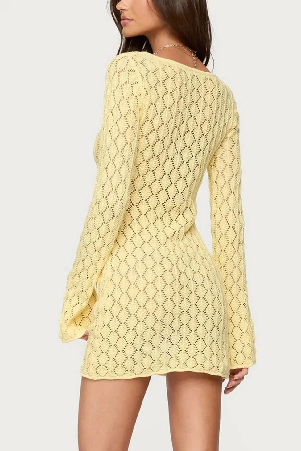 Back view of yellow crochet mini dress with diamond knit pattern