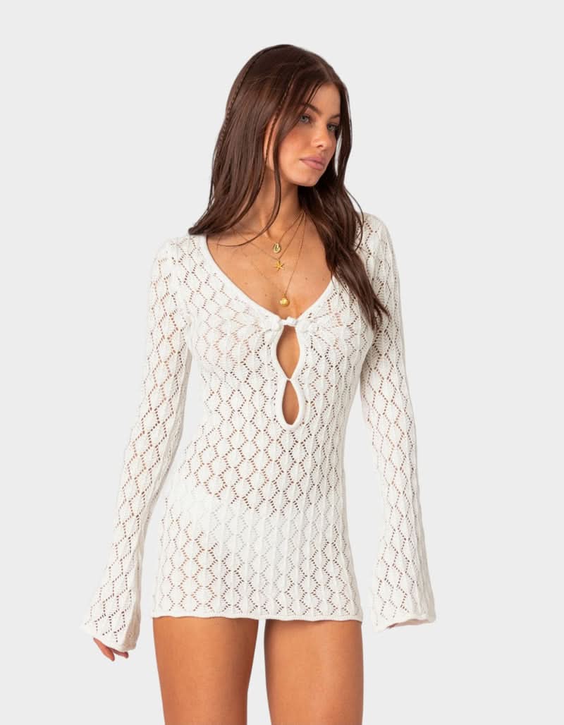 Cream crochet mini dress with v-neckline and keyhole cutout detail