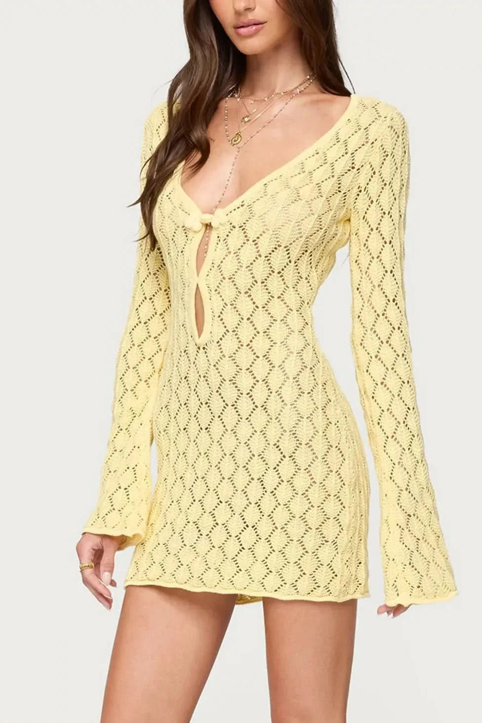 Yellow crochet mini dress with diamond pattern and long bell sleeves