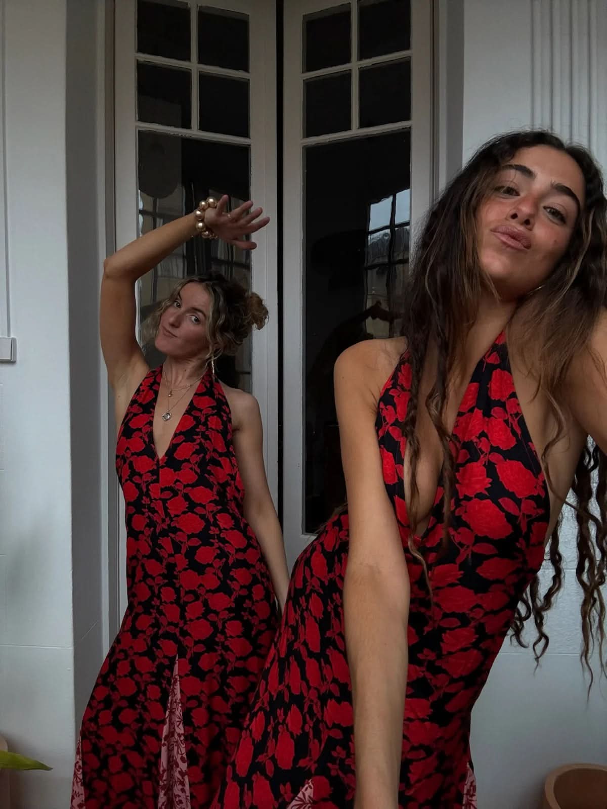 Red floral backless maxi dress with deep V-neckline and high slit detail