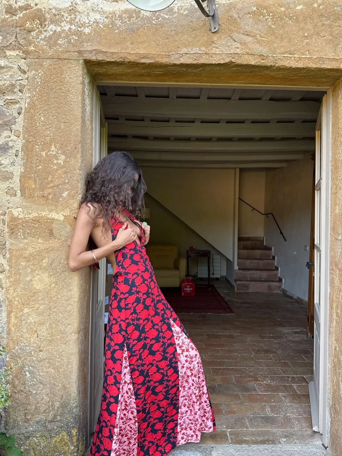 Red and black floral maxi dress with backless cut and side slit