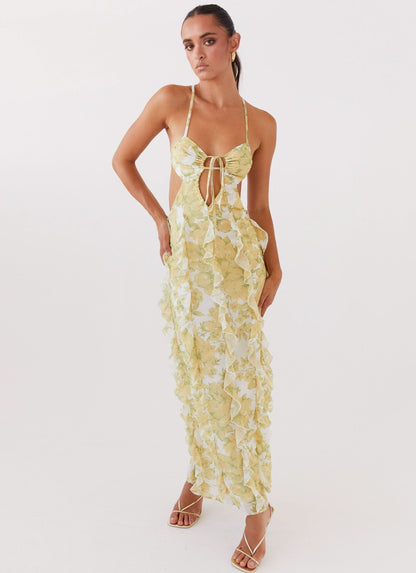 Yellow floral ruffle maxi dress with halter neckline and cut-out front detail for women