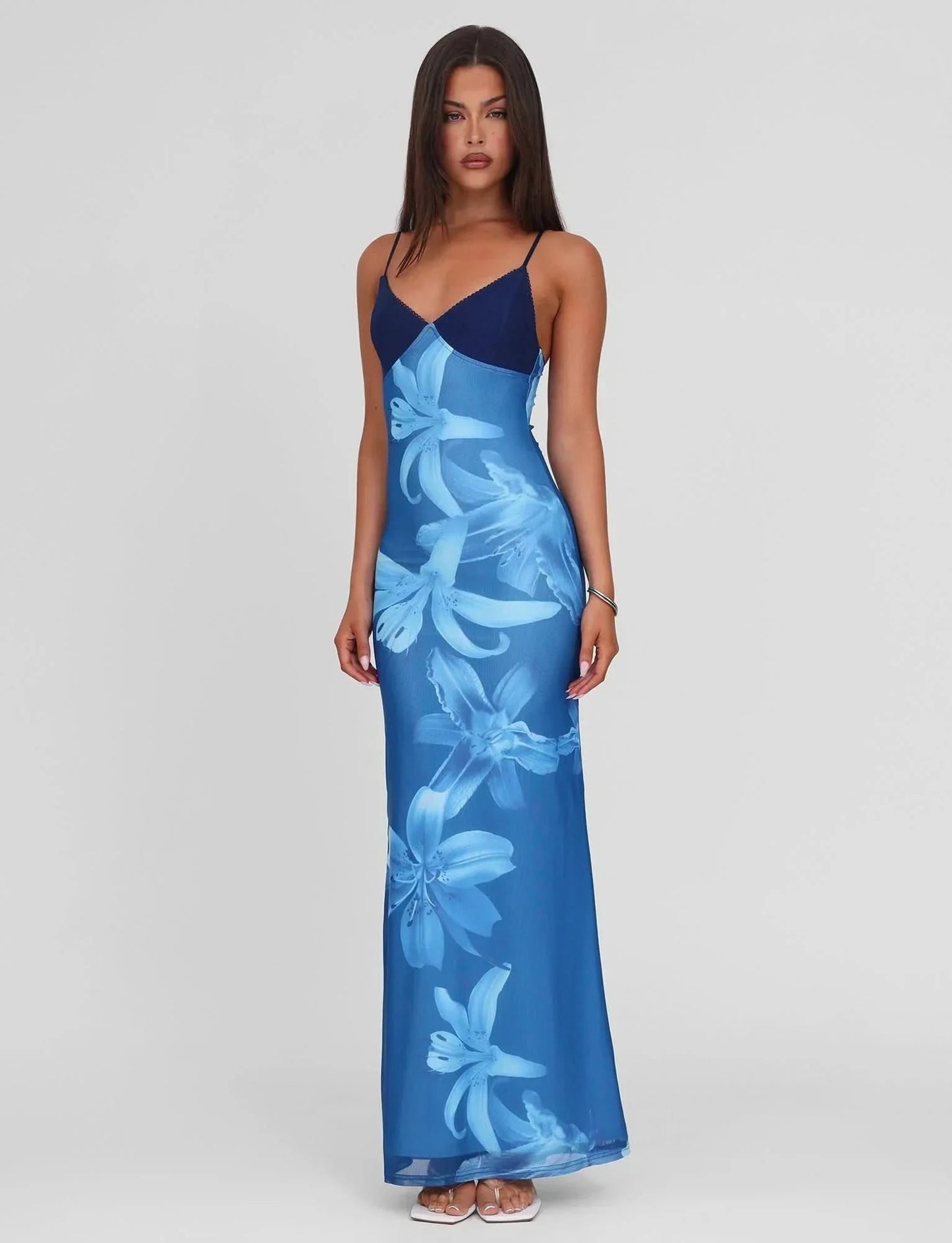 Women's blue floral formal maxi dress with draped waist detail