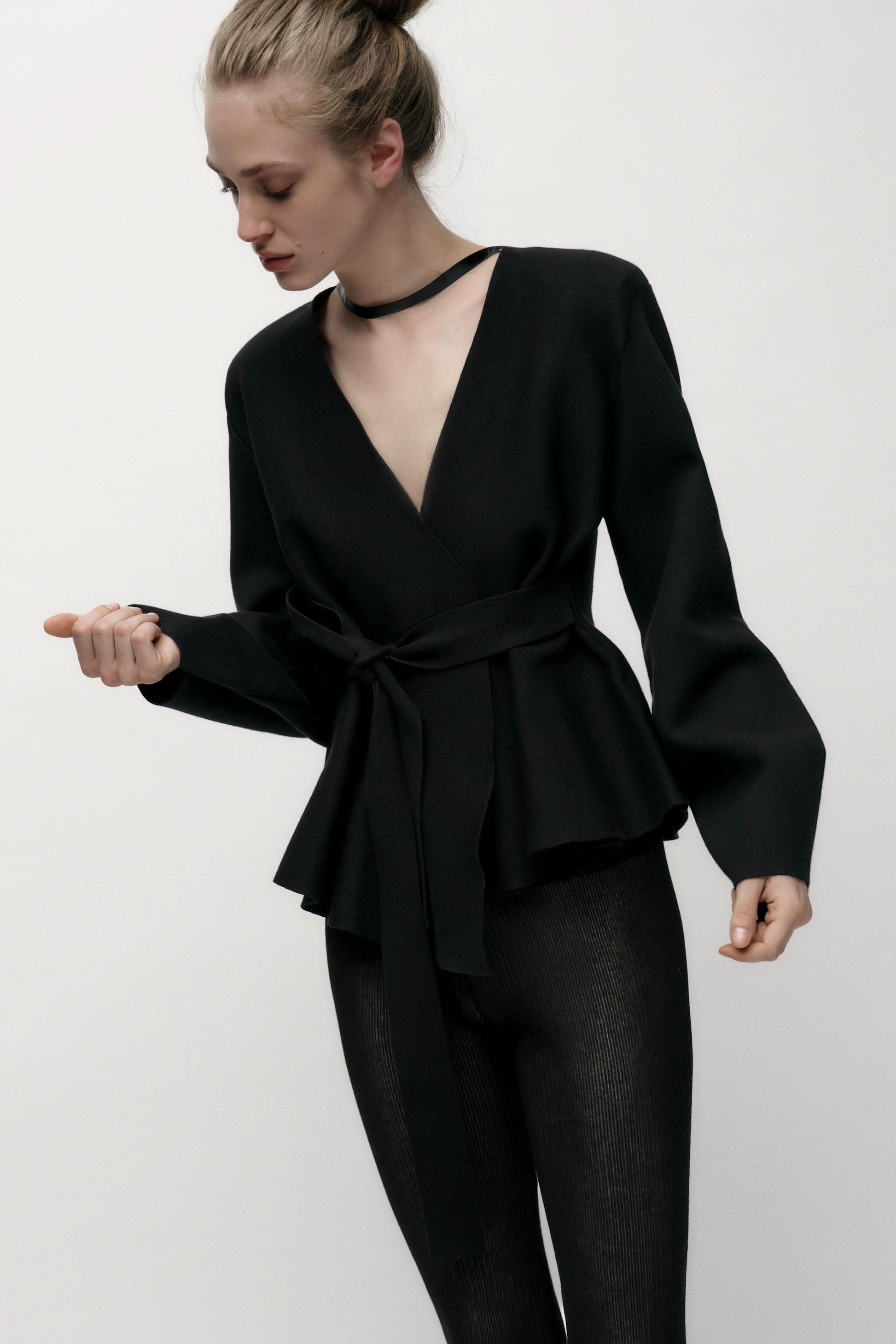 Black wrap cardigan with V-neckline and adjustable tie belt