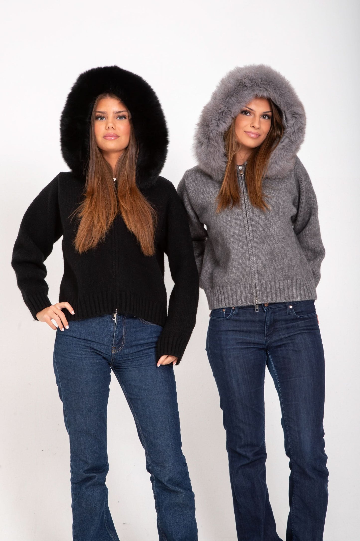 Black and gray fur-hooded cardigans with zip closure, front view