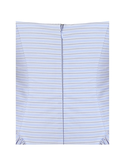 Back seam detail of blue striped mini dress with center zipper closure