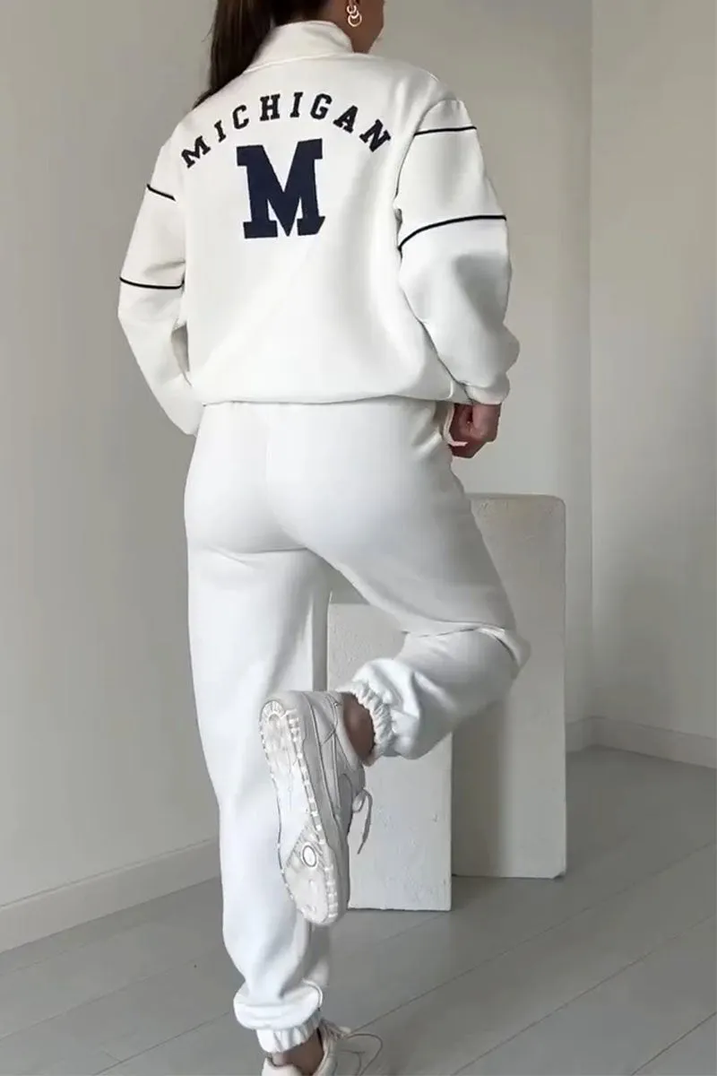 Back view of white tracksuit with Michigan M logo