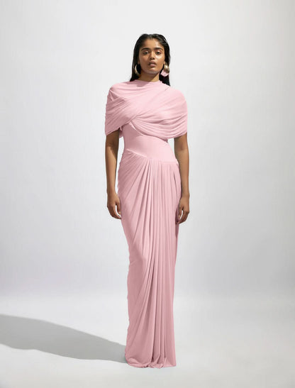 Blush pink wrap maxi dress with asymmetrical draped bodice and pleats