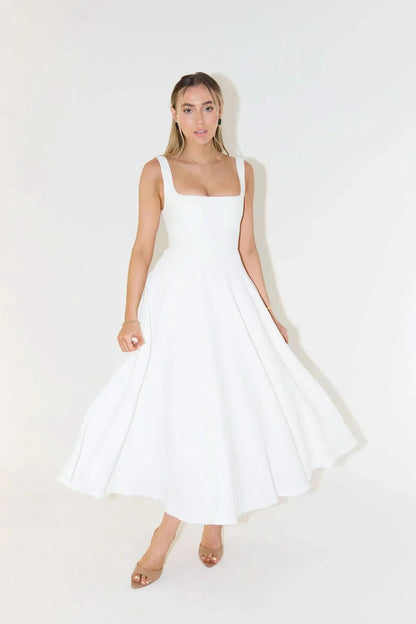 White sleeveless midi dress with square neckline and flowing A-line skirt
