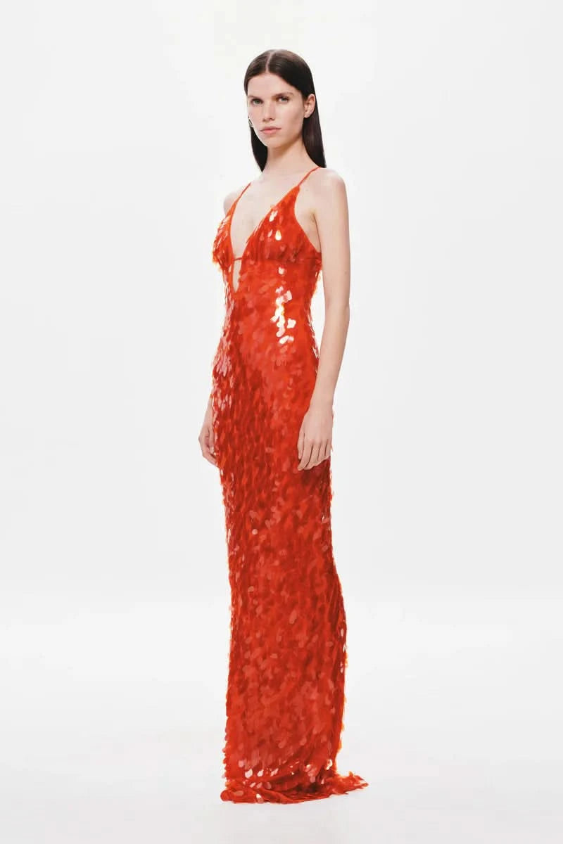 Bright red sequined maxi dress with deep v-neckline and thin straps