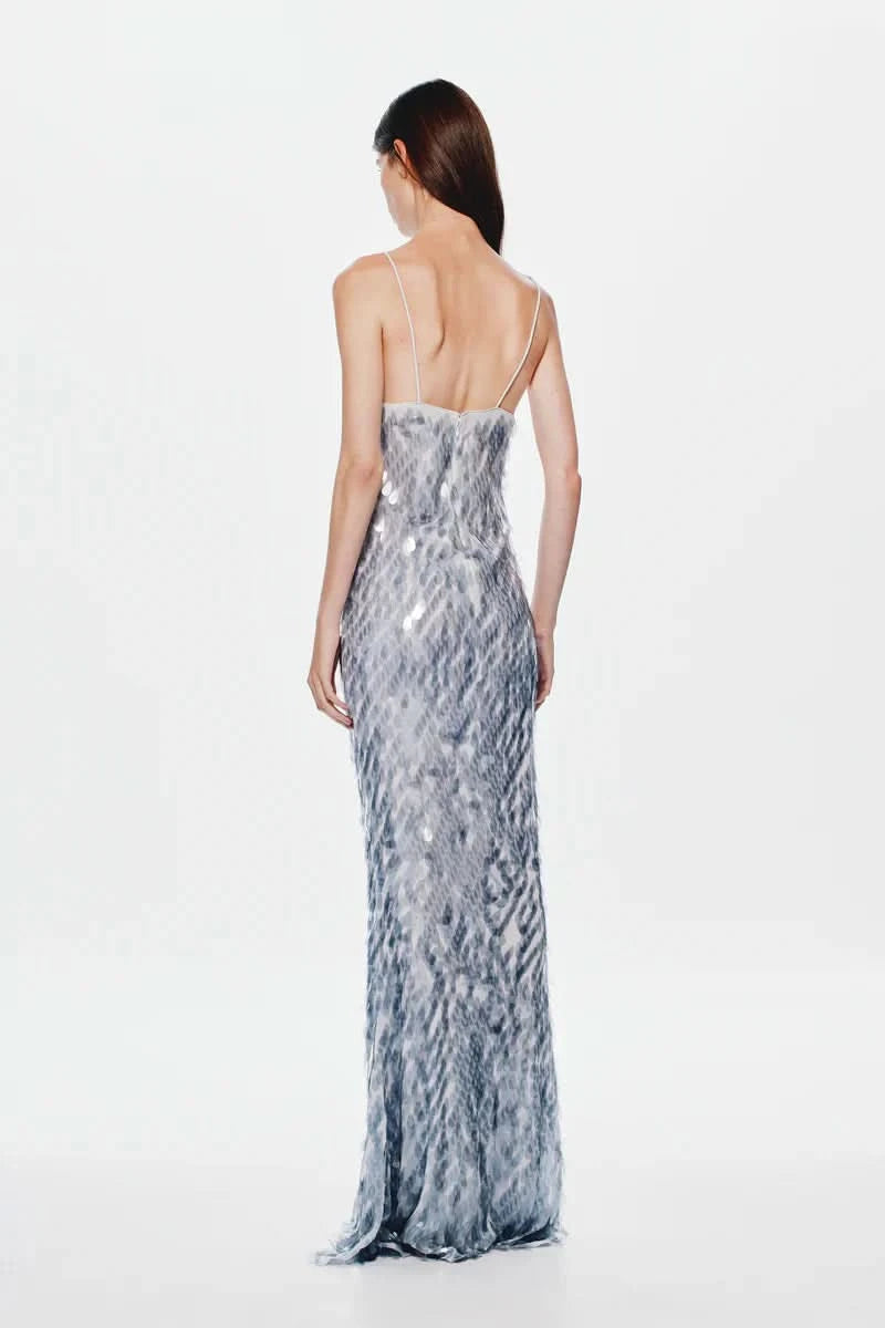 Back view of blue patterned maxi dress with thin adjustable straps
