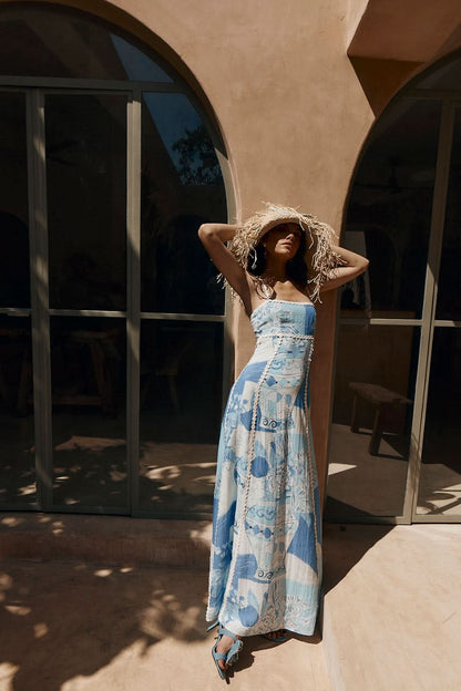 Women's midi dress with blue and white ceramic pattern and pearl beading