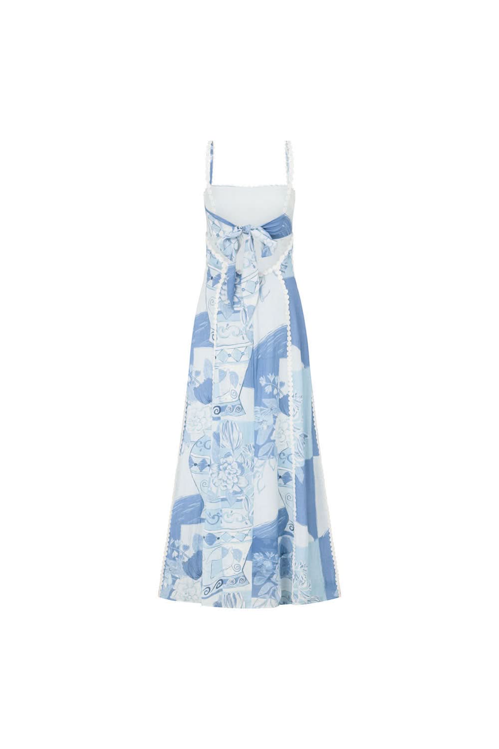 Women's midi dress showing pearl-beaded bodice and flowing blue white skirt