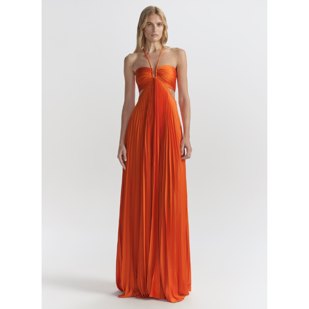 Bright orange halter maxi dress with pleated skirt and cutout sides