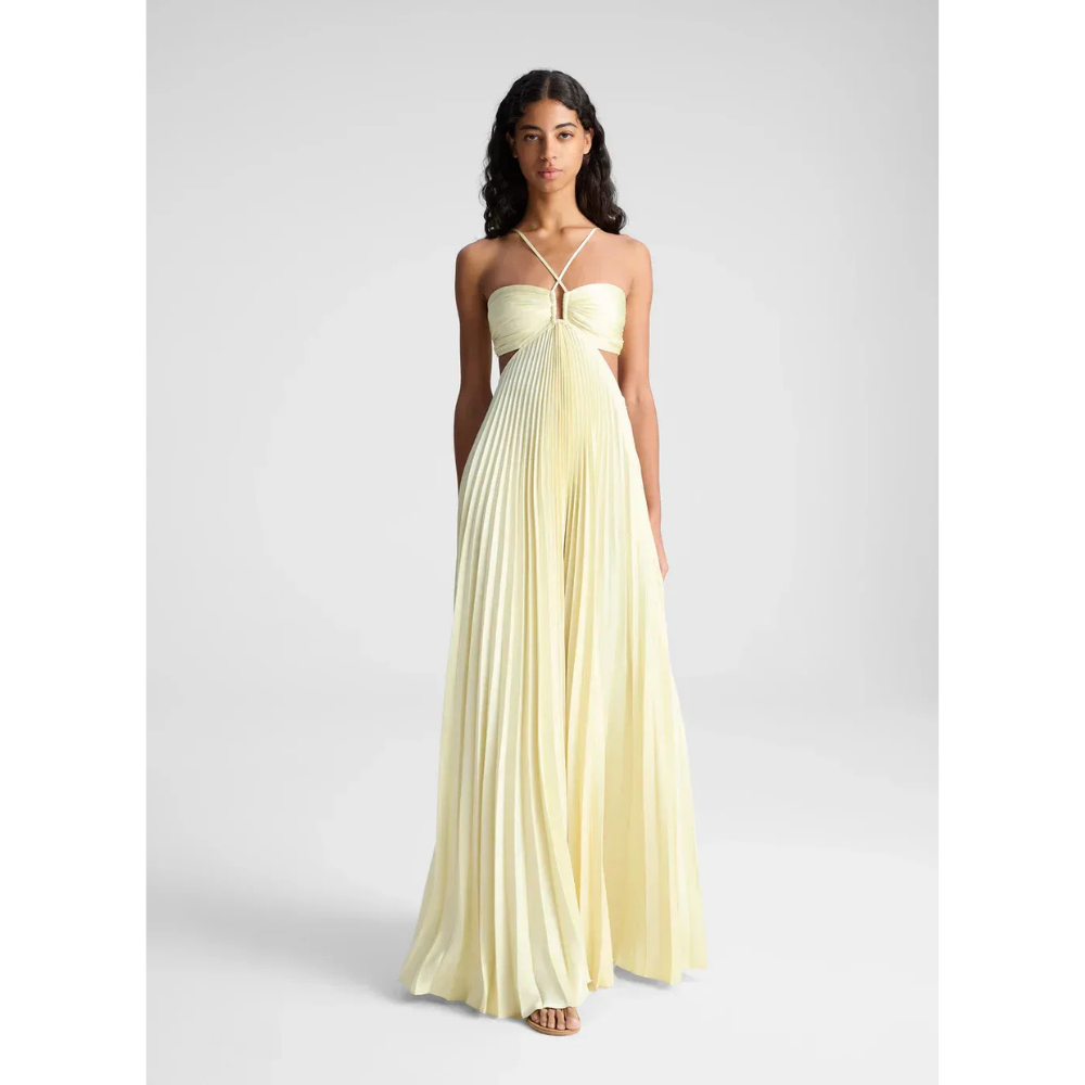 Pale yellow halter maxi dress with pleated skirt and cutout waist