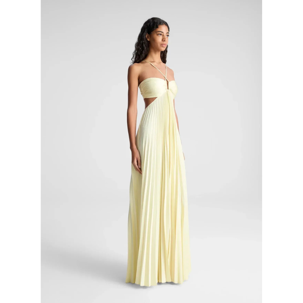 Cream halter maxi dress side view with pleated bodice and cutout