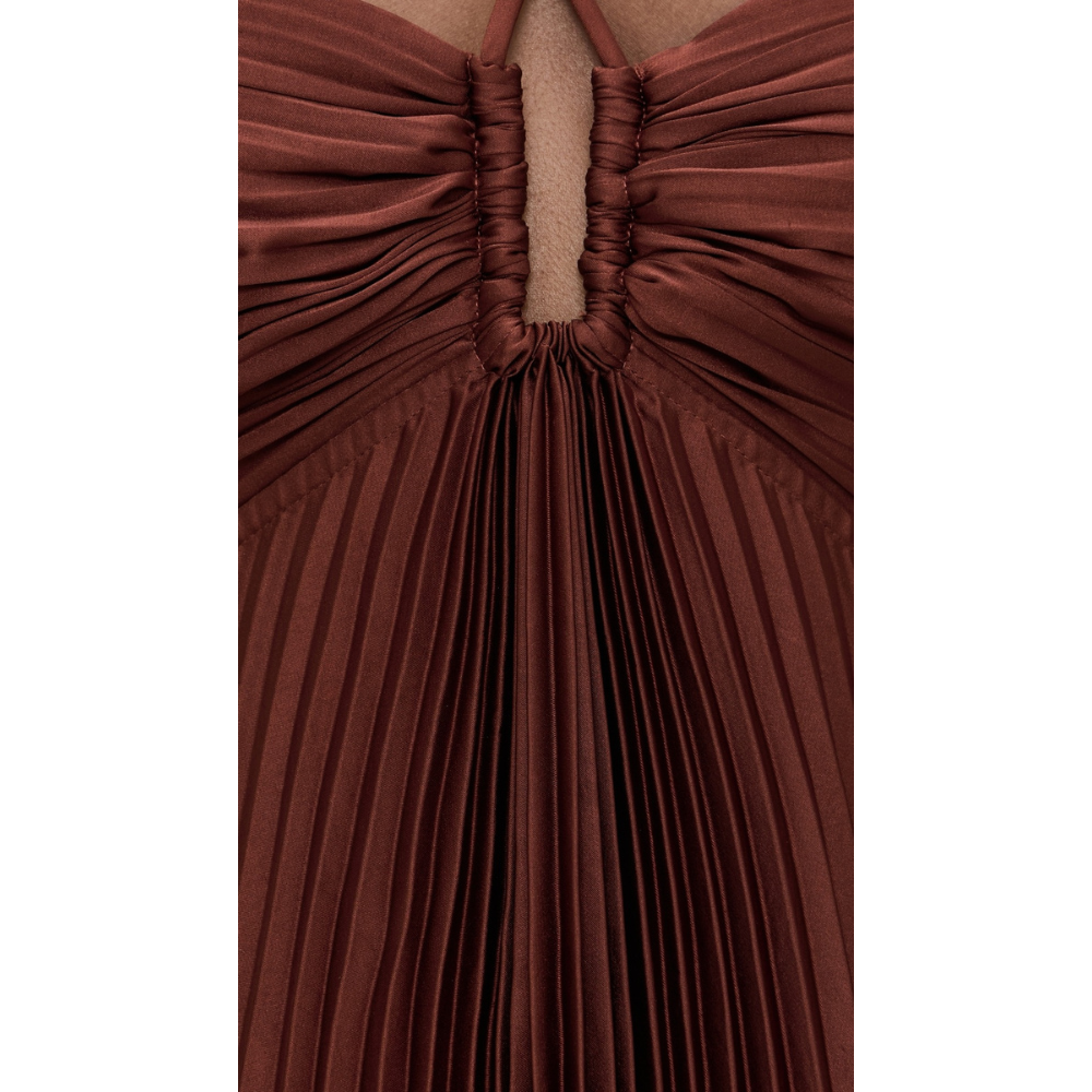 Close-up of burgundy pleated halter neckline and gathered bodice