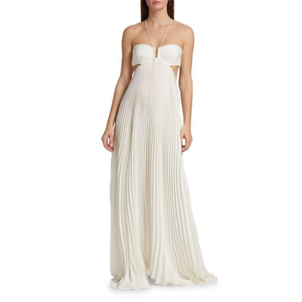Ivory halter maxi dress with pleated flowing skirt and cutout details