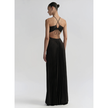 Back view of black halter maxi dress showing tied halter straps and open back design