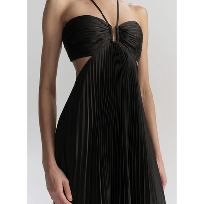 Close-up of black halter neckline with crossed straps and pleated bodice texture