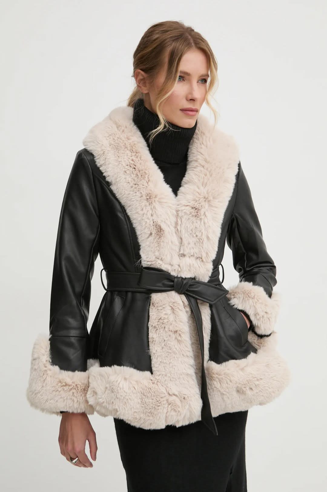 Cream faux fur collar and front detail on black leather jacket with tie belt