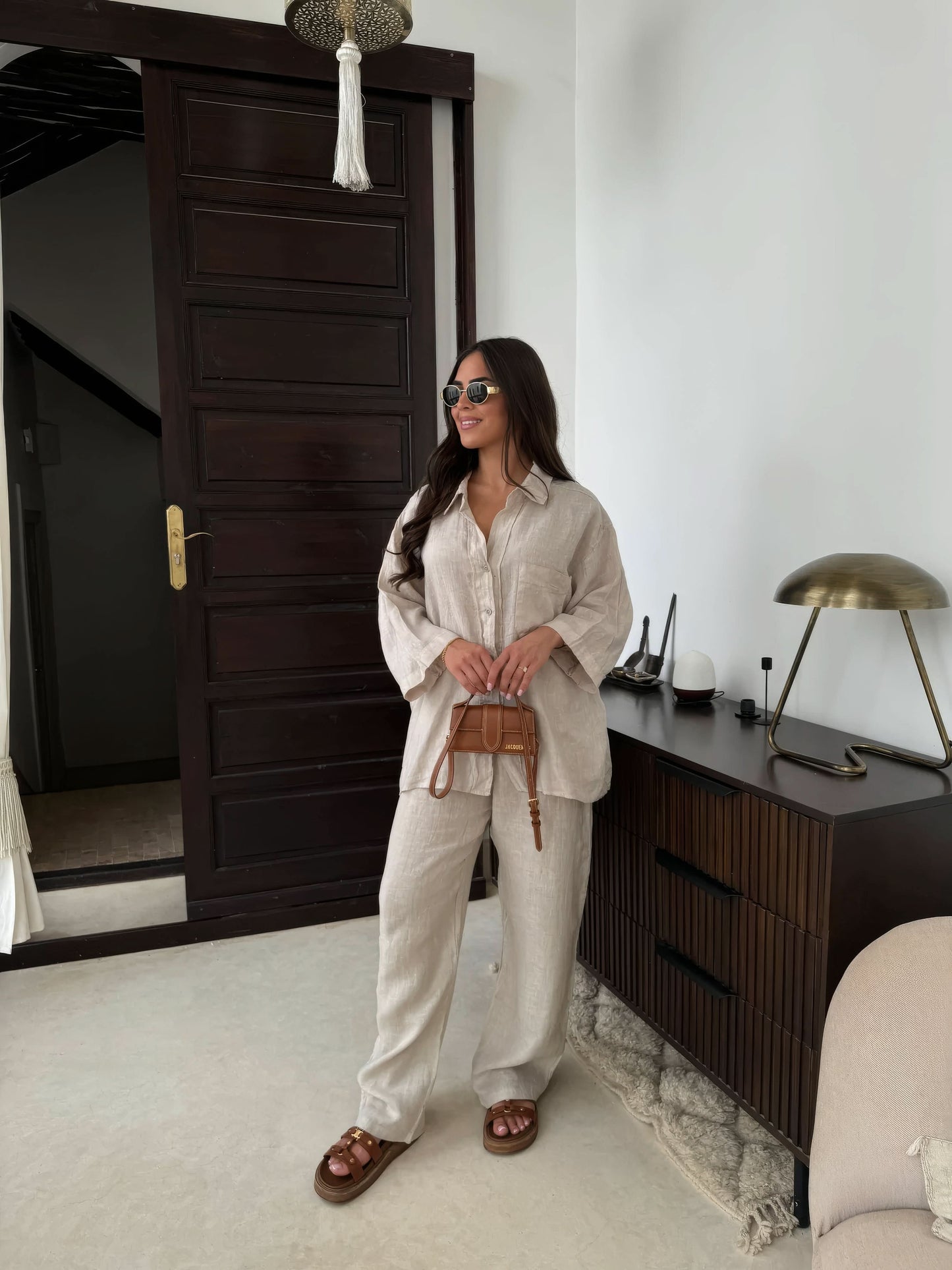 Beige linen set with oversized shirt and high-waist trousers