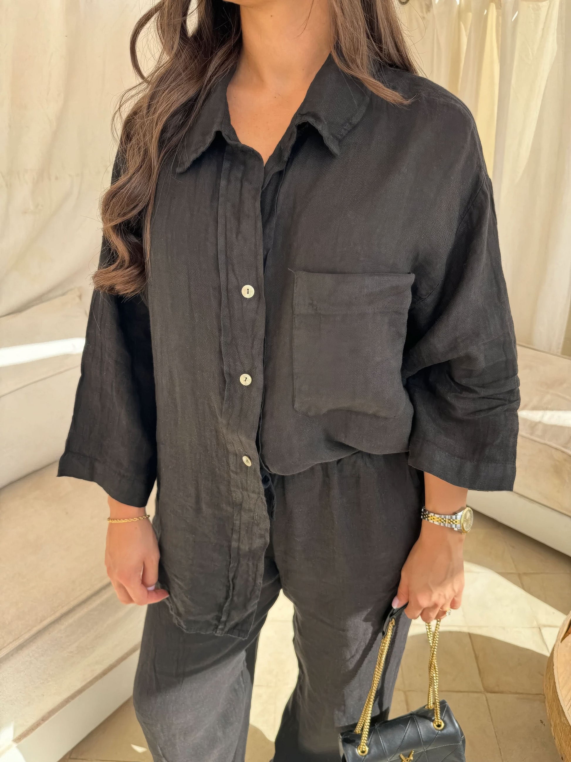 Charcoal gray linen button-up shirt with oversized fit and matching linen pants
