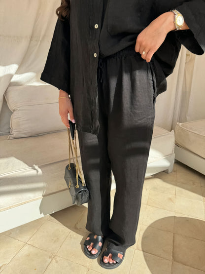 Black linen shirt and pants set with relaxed tailored fit and natural fabric texture