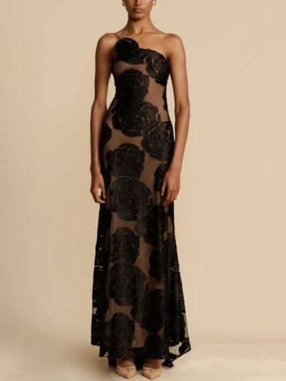 Women's black maxi evening dress with velvet rose appliqués and open back