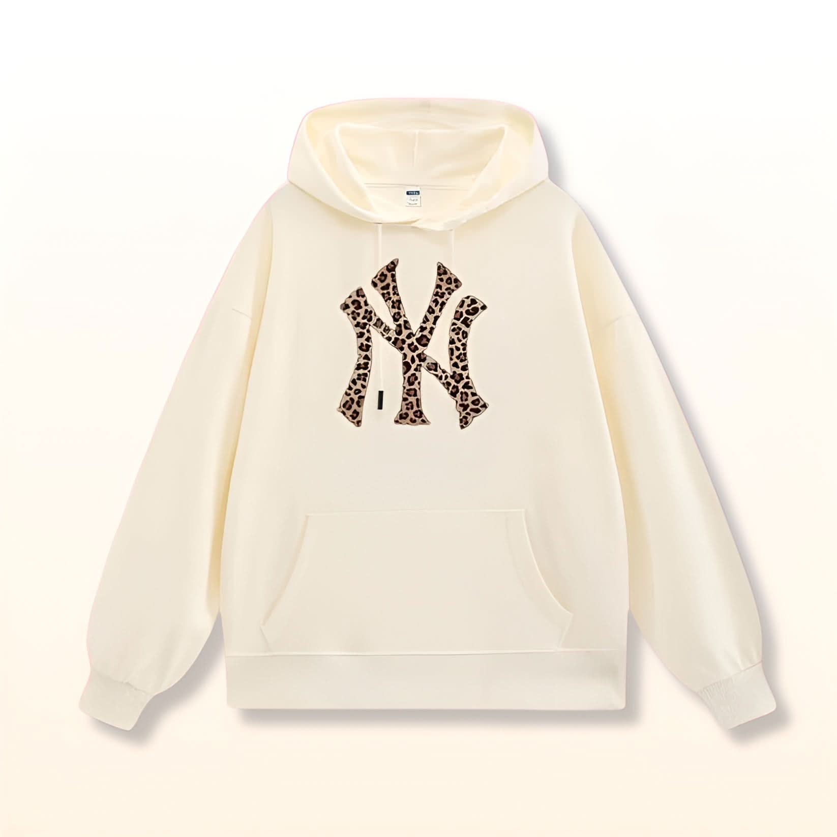 Cream pullover hoodie with leopard print NY design on chest