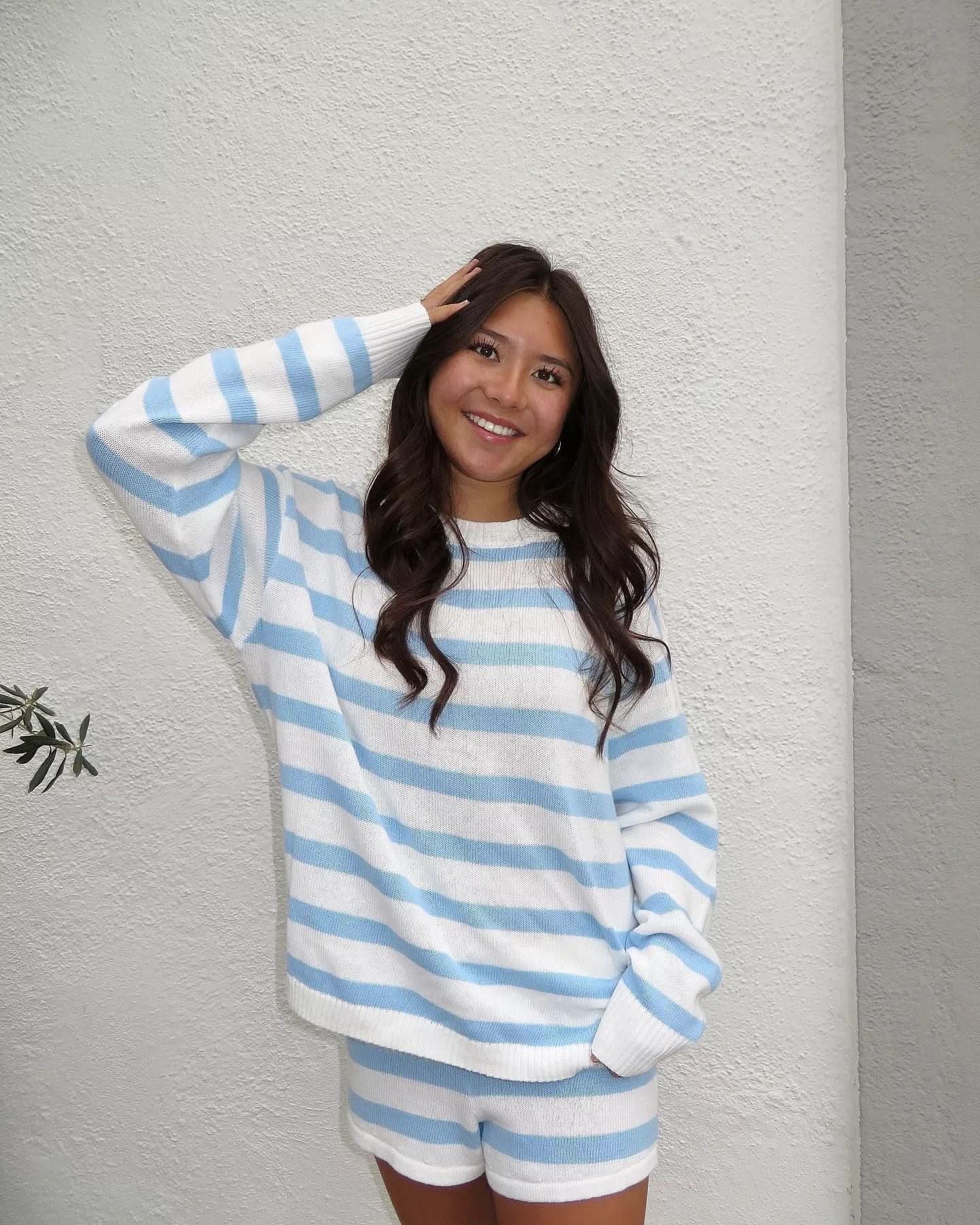 Ribbed blue and white striped knit crew neck sweater
