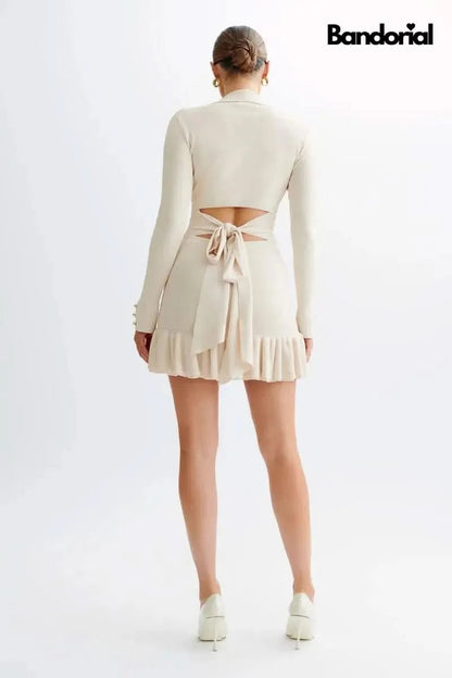 Cream mini dress with cutout back, tie waist, and pleated hem for women