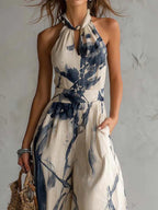 OXANA | HALTER NECK WIDE LEG JUMPSUIT - Ivory and Navy Print