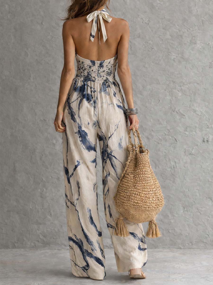 OXANA | HALTER NECK WIDE LEG JUMPSUIT - Ivory and Navy Print