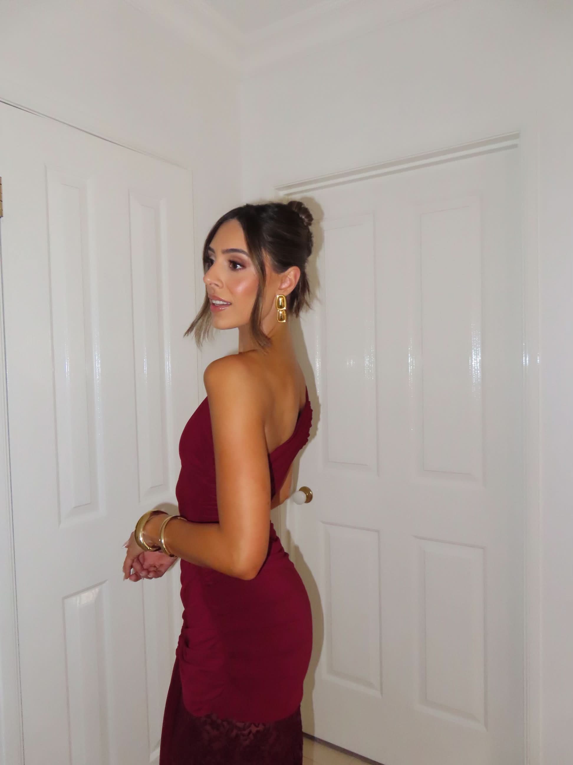 Burgundy lace maxi dress back view showing open back design