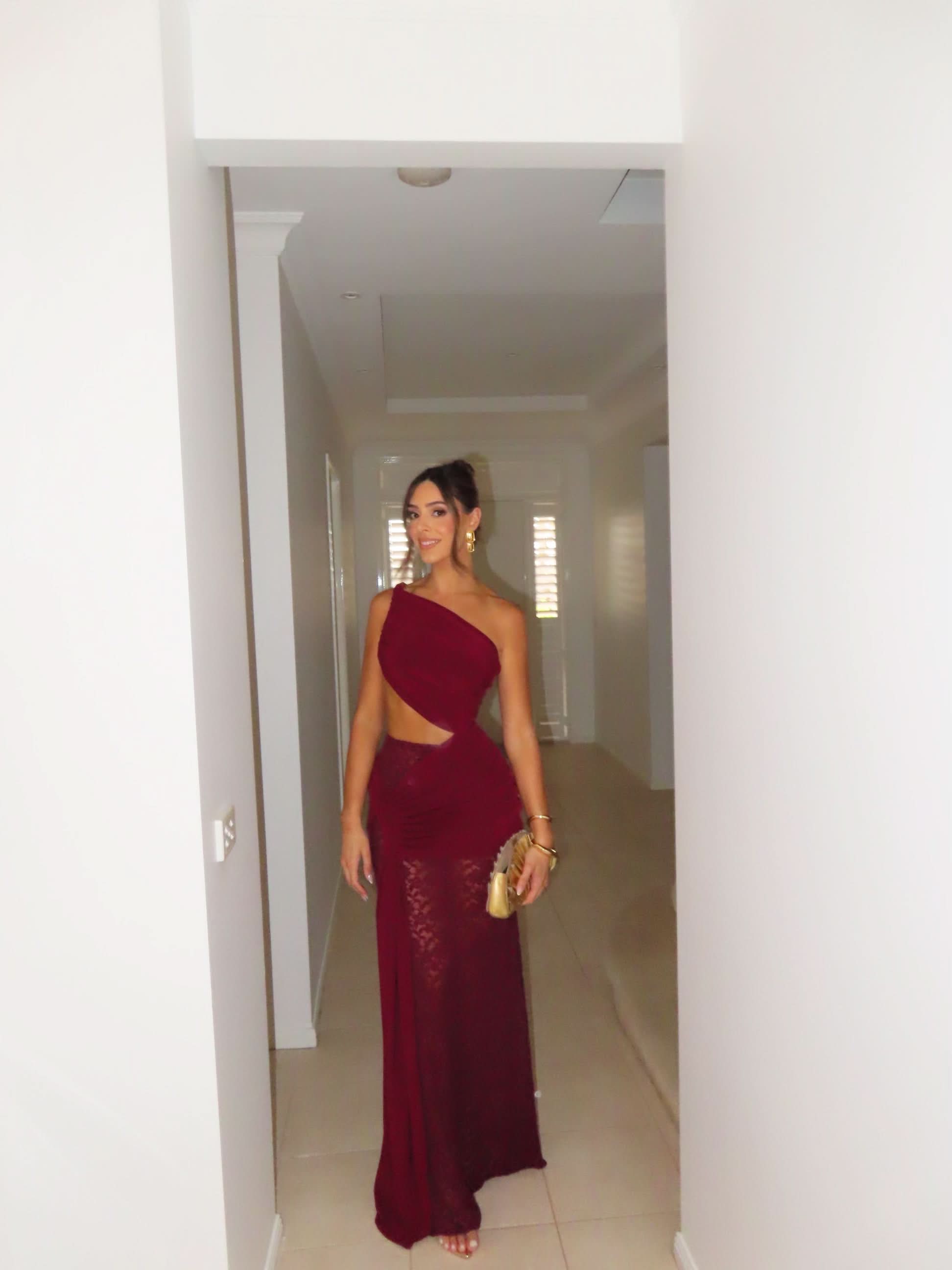 Burgundy lace maxi dress side profile with ruched waist and lace details