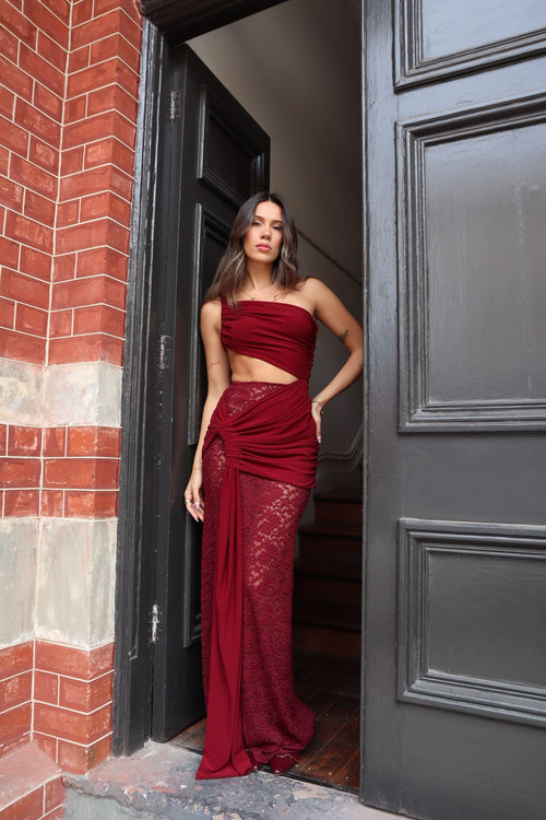 Burgundy lace maxi dress with strapless neckline and cutout waist detail