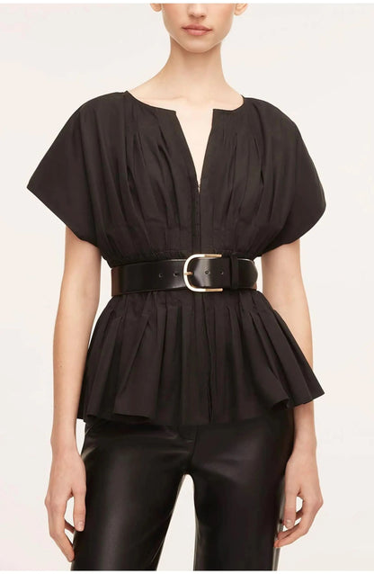 Black pleated blouse with V-neckline, flutter sleeves, and cinched waist belt for women